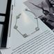 купити срібний виріб Срібний браслет з квітковими елементами без каменів фото 2 - фотографія з каталогу