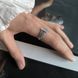 купити срібний виріб Срібна каблучка LoveR у формі печатки з рельєфним попкорн-плетінням та доріжкою фіанітів 18 розмір фото 8 - фотографія з каталогу