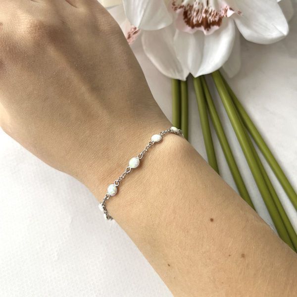 Серебряный браслет SilverThin с опалом 2.233ct, вес изделия 2,59 гр (2152828) 1720 размер 02718282512  фото с каталога