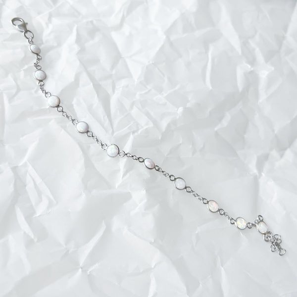 Серебряный браслет SilverThin с опалом 2.233ct, вес изделия 2,59 гр (2152828) 1720 размер 02718282512  фото с каталога