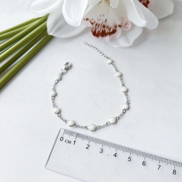 Серебряный браслет SilverThin с опалом 2.233ct, вес изделия 2,59 гр (2152828) 1720 размер 02718282512  фото с каталога