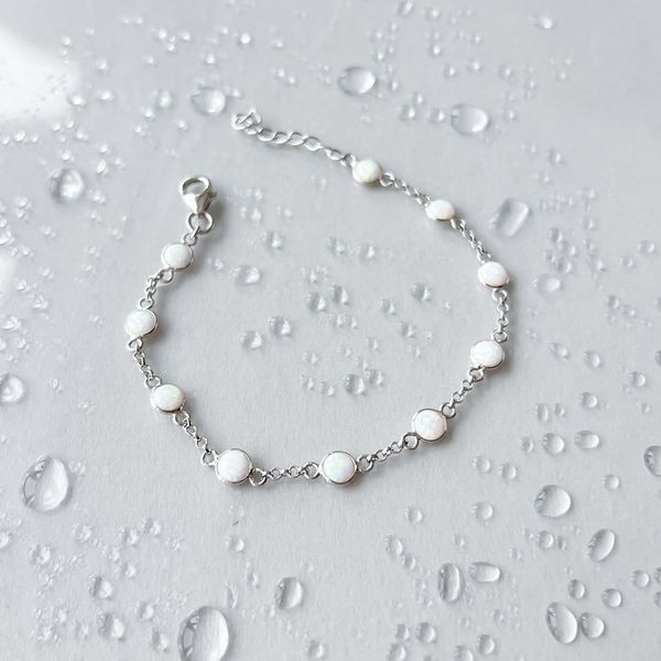 Серебряный браслет SilverThin с опалом 2.233ct, вес изделия 2,59 гр (2152828) 1720 размер 02718282512  фото с каталога