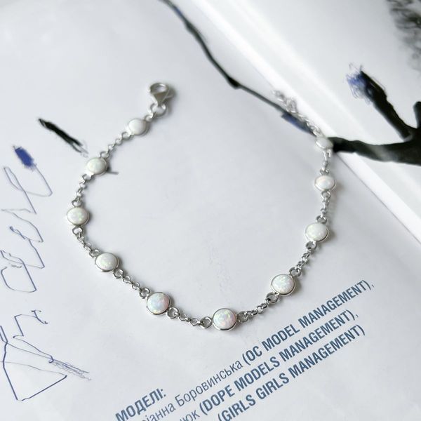 Серебряный браслет SilverThin с опалом 2.233ct, вес изделия 2,59 гр (2152828) 1720 размер 02718282512  фото с каталога