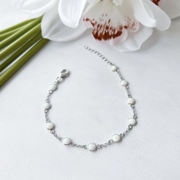 Серебряный браслет SilverThin с опалом 2.233ct, вес изделия 2,59 гр (2152828) 1720 размер 02718282512  фото с каталога