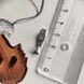 купить серебряное изделие Серебряная подвеска LoveR с геометричной формой и фианитами в центральной вставке фото 4 - фотография из каталога