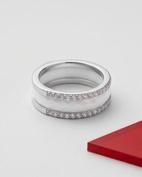 Серебряное кольцо с белой керамикой и фианитами 18.5 размера 121445918.5 Серебряное кольцо LoveR с белой керамикой и круглой фасетированной вставкой фото с каталога
