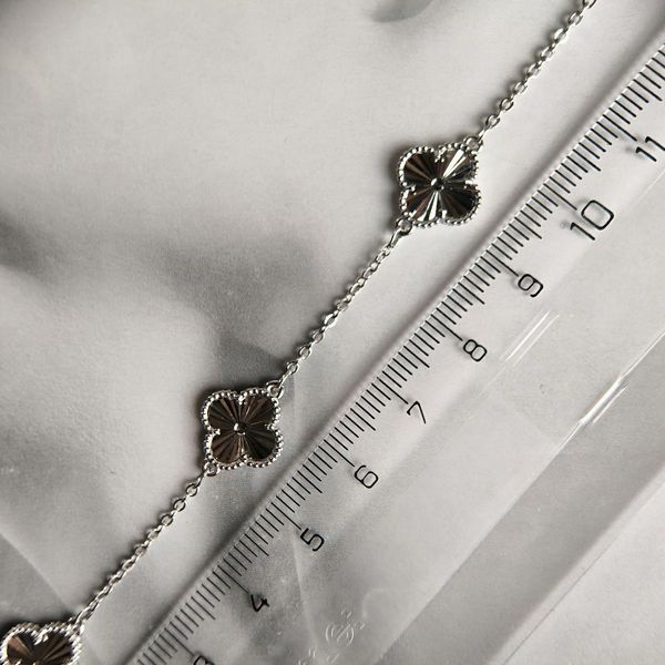 Серебряный браслет с серебристыми клеверами (алмазная текстура) 17-20 см 027123120006 Серебряный браслет с серебристыми клеверами (алмазная текстура) фото с каталога