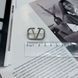 купить серебряное изделие Серебряная брошь в форме элегантного символа &ndash; стильный акцент для современного образа фото 4 - фотография из каталога