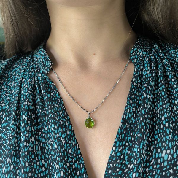 Серебряная подвеска Ювелирных украшений с хризолітом (60002316) 61320006 Серебряная подвеска Ювелирных украшений с хризолітом (60002316) фото з каталогу