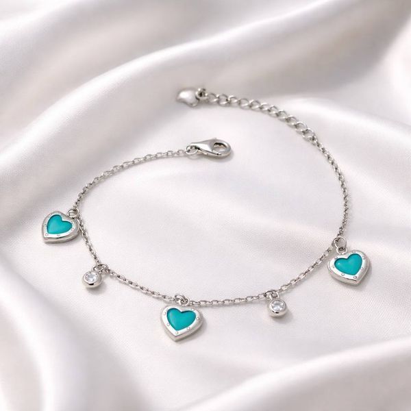 Серебряный браслет с подвесками в форме сердца Tiffany &ndash; элегантный шарм с мятными вставками 02718263412 Серебряный браслет с подвесками в форме сердца Tiffany &ndash; элегантный шарм с мятными вставками фото с каталога