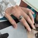 купити срібний виріб Срібна каблучка LoveR з фіанітами у сучасному геометричному дизайні 18 розмір фото 7 - фотографія з каталогу