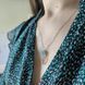 купить серебряное изделие Серебряная цепочка с подвеской в форме открытого овала и вставкой из бирюзы фото 8 - фотография из каталога