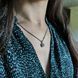 купить серебряное изделие Серебряная подвеска 925 пробы с круглыми фианитами в цветочной форме фото 8 - фотография из каталога
