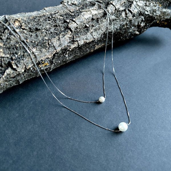 Серебряное колье с жемчугом 0540042290612 Серебряное колье с жемчугом фото с каталога