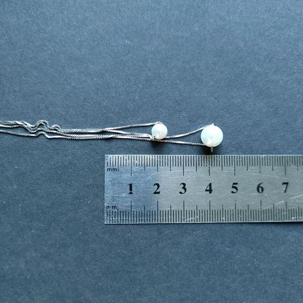 Серебряное колье с жемчугом 0540042290612 Серебряное колье с жемчугом фото с каталога