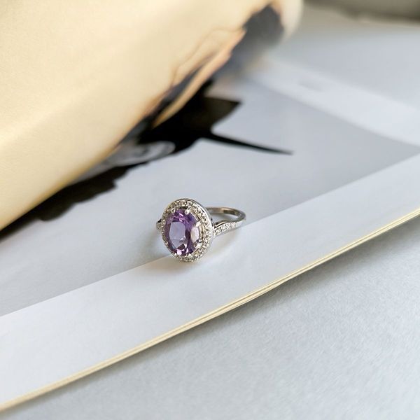 Серебряное кольцо с натуральным аметистом 712133612 Серебряное кольцо с натуральным аметистом фото з каталогу