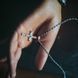 купить серебряное изделие Серебряный крестик LoveR с фианитами и золотистыми акцентами фото 6 - фотография из каталога