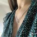 купить серебряное изделие Серебряная подвеска с овальным топазом фото 8 - фотография из каталога