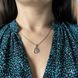 купить серебряное изделие Серебряная подвеска LoveR в форме сердца с коньком и фианитами фото 7 - фотография из каталога