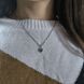 купити срібний виріб Срібна підвіска LoveR з містичним топазом у формі серця та сяючим обідком фіанітів фото 7 - фотографія з каталогу