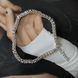 купити срібний виріб Срібний тенісний браслет з натуральним рубіном 17-20 см фото 2 - фотографія з каталогу